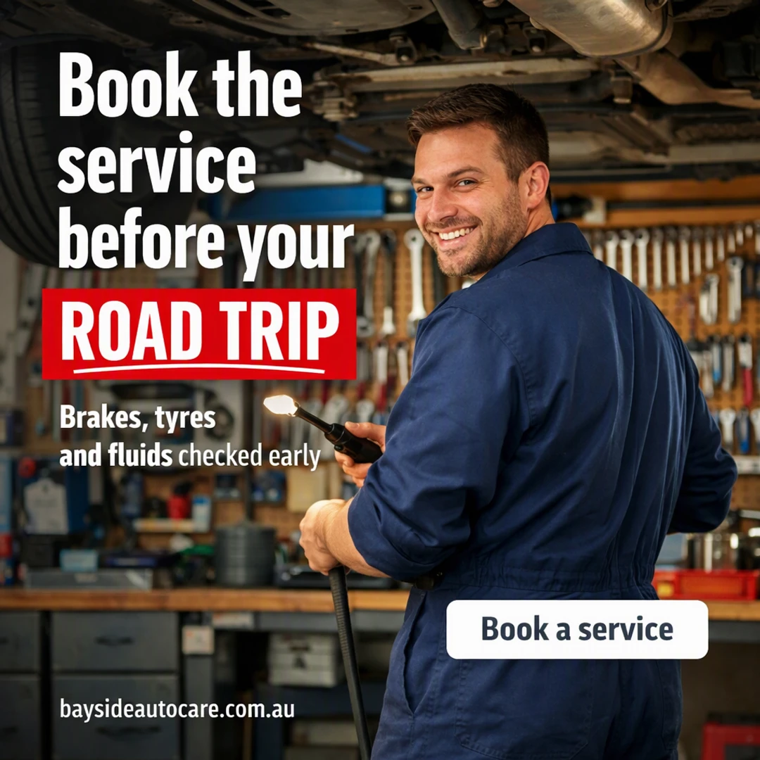 Finished post: a mechanic beneath a car on a hoist, torch in hand, with the text “Book the service before your road trip” “road trip” “Brakes, tyres and fluids checked early” “Book a service”